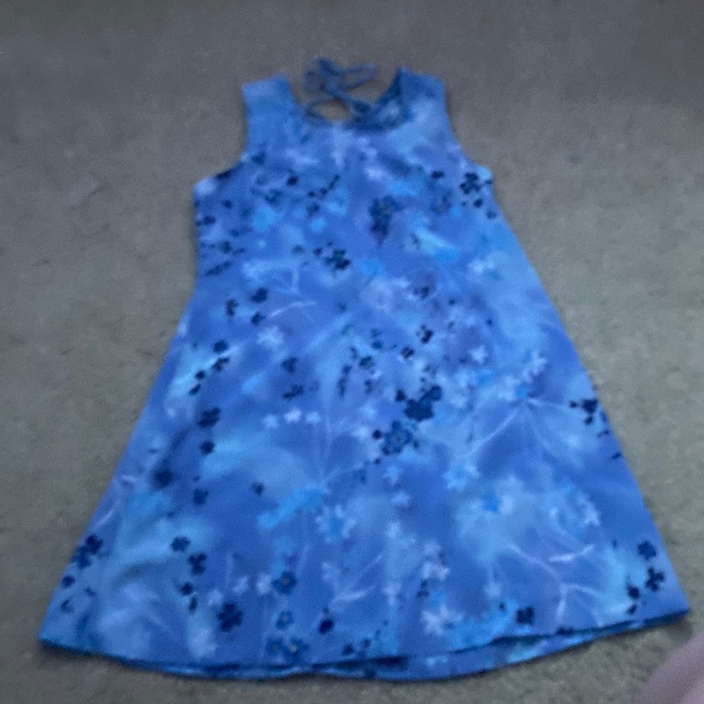 This is a blue dress it has ties on the back and it is a small